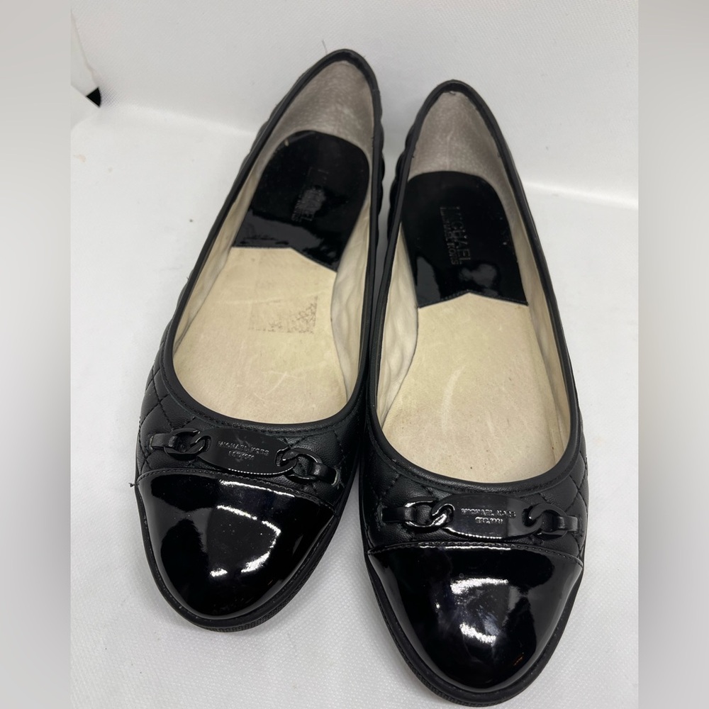 Black Michael Kors quilted flat shoe